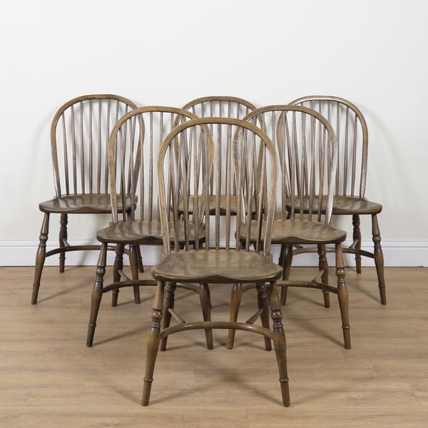 A SET OF SIX ELM STICKBACK DINING CHAIRS (6)