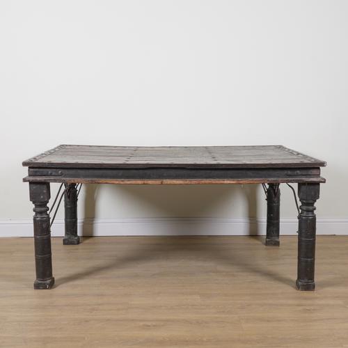 A 19TH CENTURY INDIAN IRON BOUND TEAK CENTRE TABLE