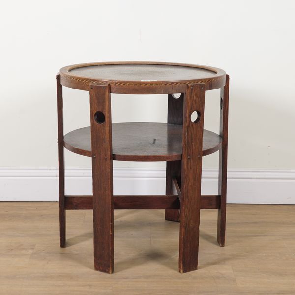 AN ARTS AND CRAFTS OAK CIRCULAR OCCASIONAL TABLE