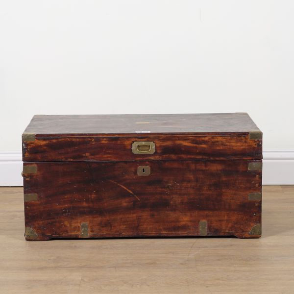 AN EARLY 20TH CENTURY BRASS BOUND CAMPHOR WOOD TRUNK