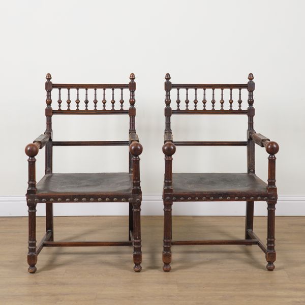 A PAIR OF 19TH CENTURY CONTINENTAL OAK FRAMED OPEN ARMCHAIRS (2)
