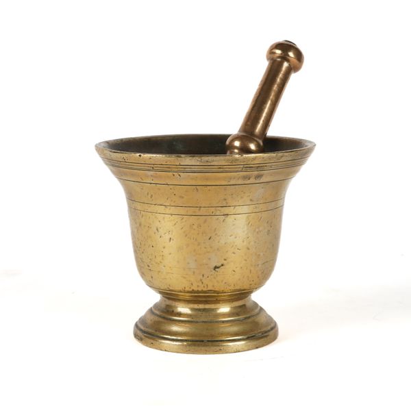 A POLISHED BRONZE MORTAR AND PESTLE (2)