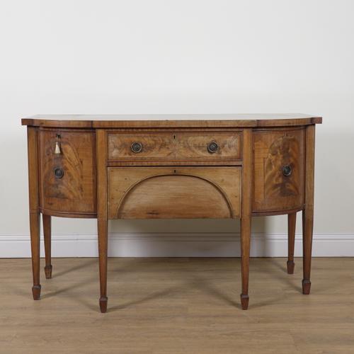 A GEORGE III INLAID MAHOGANY BOWFRONT SIDEBOARD