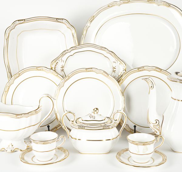 A SPODE WHITE AND GILT `SHEFFIELD' PATTERN BONE CHINA PART DINNER AND COFFEE SERVICE