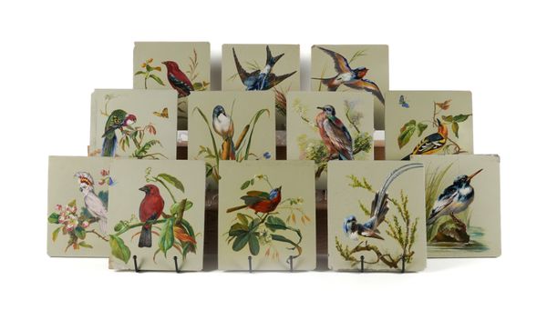 A GROUP OF TWENTY THREE EARTHENWARE TILES (23)