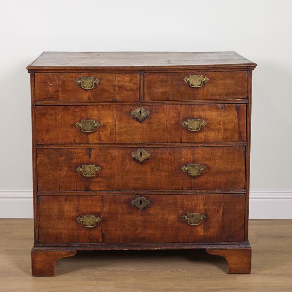 AN EARLY 18TH CENTURY WALNUT FIVE DRAWER CHEST OF DRAWERS