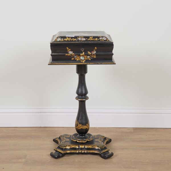 AN EARLY VICTORIAN MOTHER OF PEARL INLAID GILT FLORAL DECORATED PAPIER MACHE SEWING BOX ON STAND