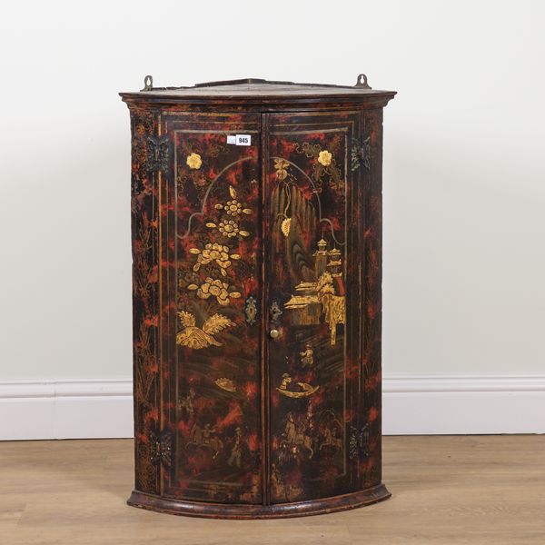 AN EARLY 18TH CENTURY CHINOISERIE DECORATED BOWFRONT HANGING CORNER CUPBOARD