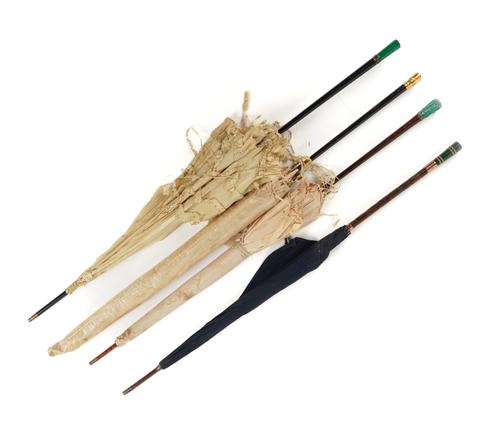 A GREEN HARDSTONE AND FACETED ROCK CRYSTAL MOUNTED UMBRELLA  AND THREE OTHERS (4)