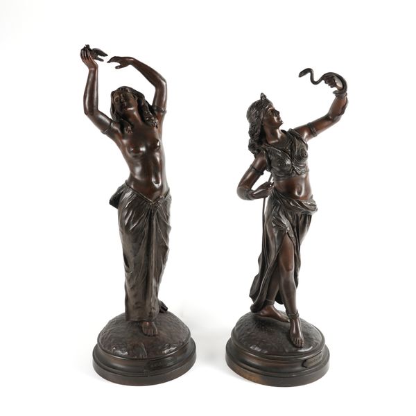 EDOURD DROUT (FRENCH, 1859 -1945): A PAIR OF FRENCH BRONZE FIGURES OF A SNAKE CHARMER AND A LOVE LETTER ENTITLED 'UN MESSAGE D'AMOUR' & CHARMEUSE DE SERPENTS (2)