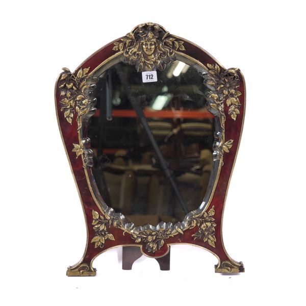 A 19TH CENTURY FRENCH GILT METAL MOUNTED TORTOISESHELL DRESSING TABLE MIRROR