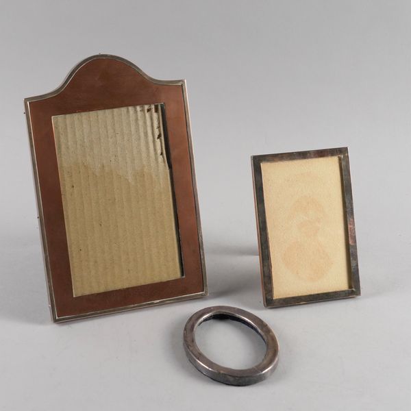 THREE SILVER MOUNTED PHOTOGRAPH FRAMES (3)