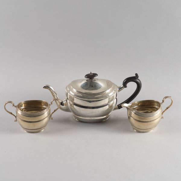 A SILVER THREE PIECE TEA SET (3)