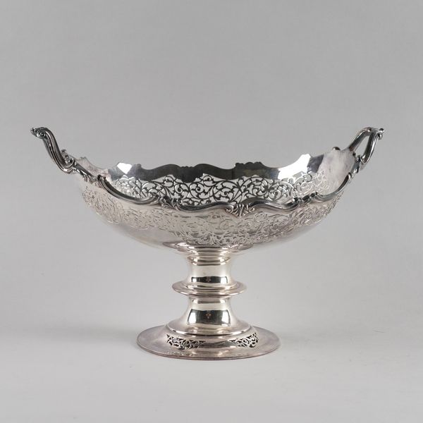 A SILVER TWIN HANDLED CENTRE PIECE BOWL