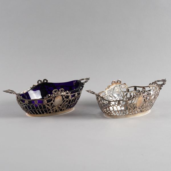 A PAIR OF DUTCH SILVER TWIN HANDLED BONBON DISHES (2)