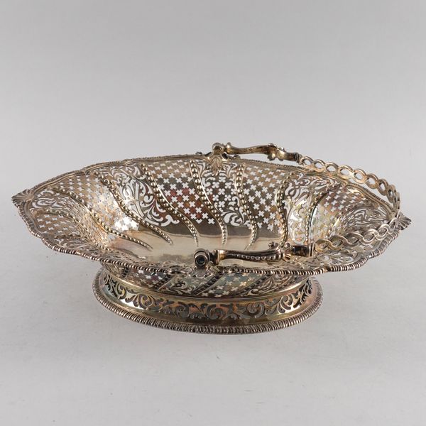 A LATE GEORGE II SILVER BREAD BASKET