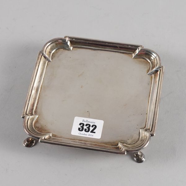 A GEORGE II SILVER SHAPED SQUARE WAITER