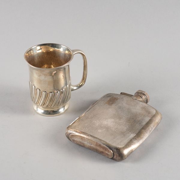 A SILVER CHRISTENING MUG AND A SILVER SPIRIT FLASK (2)