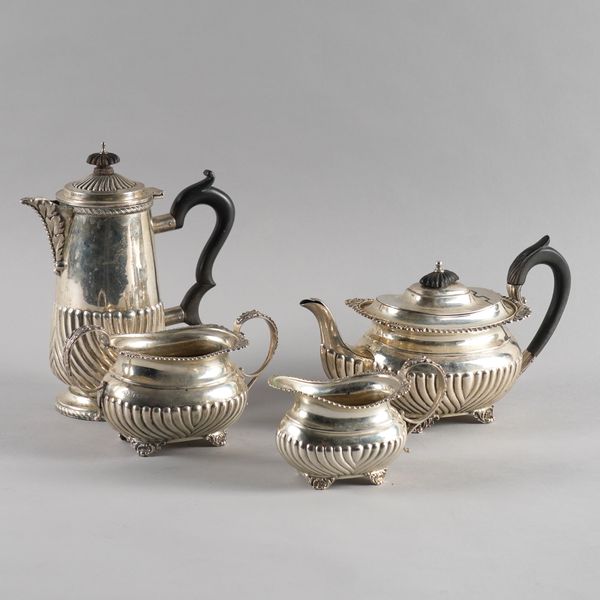 A SILVER FOUR PIECE TEA SET (4)