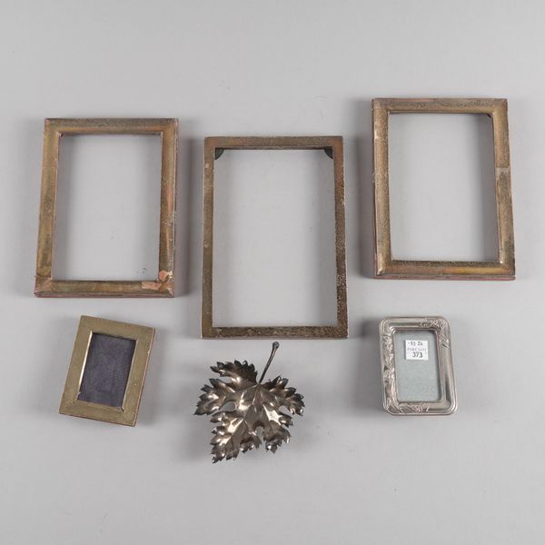 A BUCCELLATI SILVER DISH AND FIVE PHOTOGRAPH FRAMES (6)