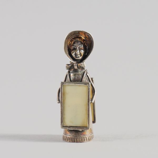 A SILVER SUFFRAGETTE PEPPERETTE