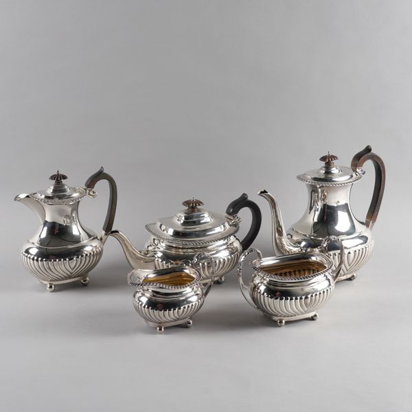 A SILVER COMPOSITE FIVE PIECE TEA AND COFFEE SET (5)