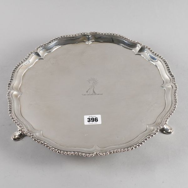 A GEORGE III SHAPED CIRCULAR SILVER SALVER