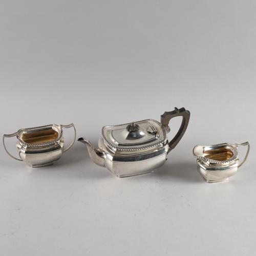 A SILVER THREE PIECE TEA SET (3)
