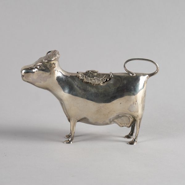 A SILVER COW CREAMER