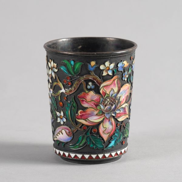 A RUSSIAN SILVER AND POLYCHROME ENAMELLED BEAKER