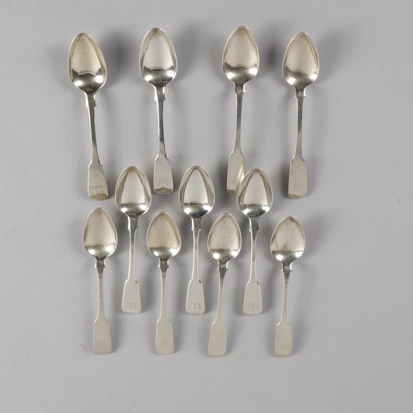 ELEVEN SILVER FIDDLE PATTERN TEASPOONS (11)