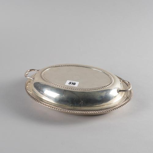 A SILVER TWIN HANDLED OVAL LIDDED ENTREE DISH