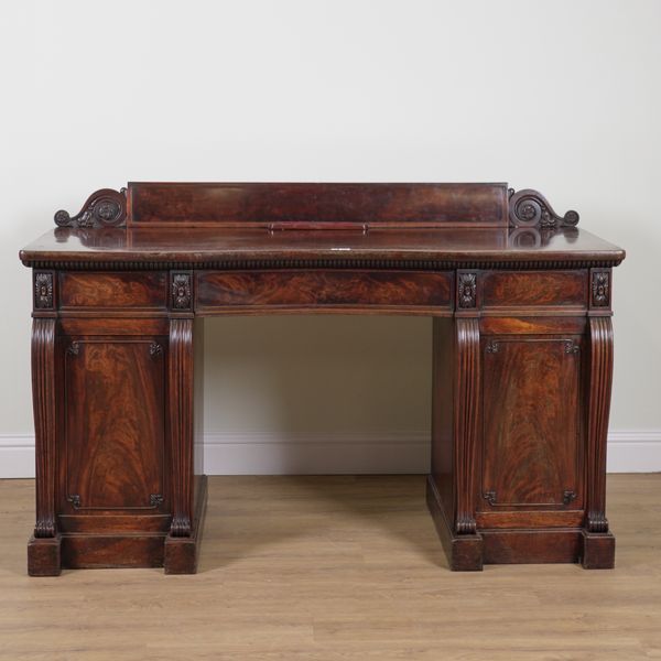 A REGENCY MAHOGANY PEDESTAL SIDEBOARD