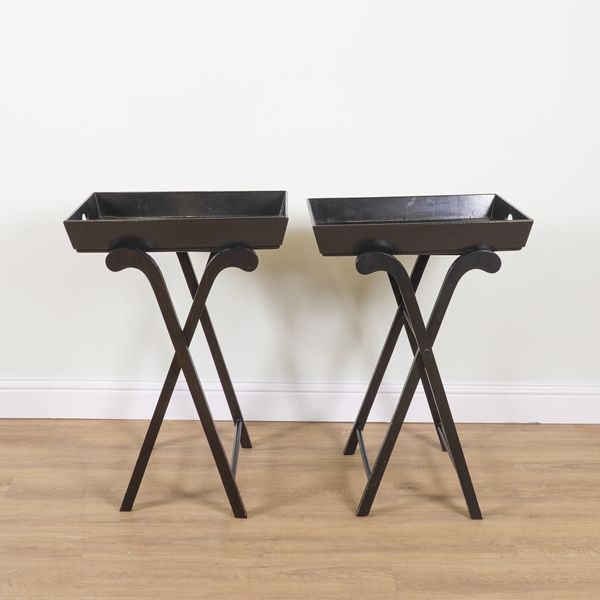 OKA; A PAIR OF BLACK LACQUER TRAY TOP SIDE TABLES