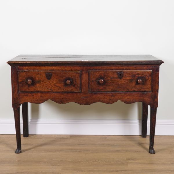 A SMALL 18TH CENTURY OAK TWO DRAWER DRESSER BASE