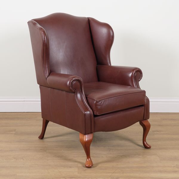 SHERBORNE; A MODERN LEATHER UPHOLSTERED WINGBACK ARMCHAIR