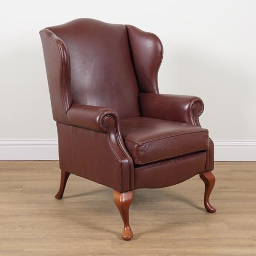 SHERBORNE; A MODERN LEATHER UPHOLSTERED WINGBACK ARMCHAIR