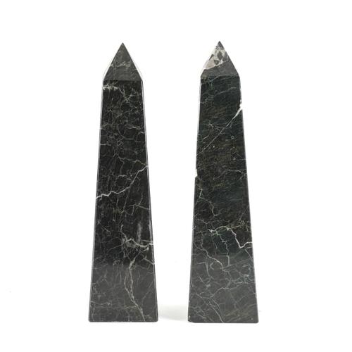 A PAIR OF BLACK VARIEGATED MARBLE ORNAMENTAL OBELISKS (2)