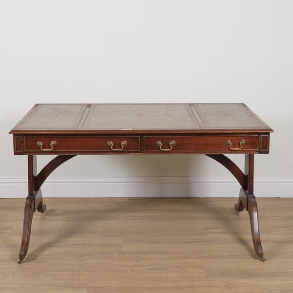 A REGENCY STYLE MAHOGANY RECTANGULAR WRITING TABLE