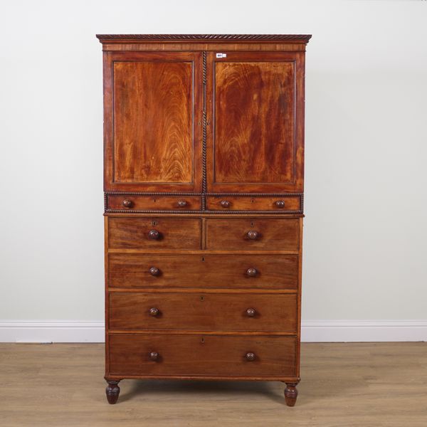 AN 19TH CENTURY MAHOGANY LINEN PRESS