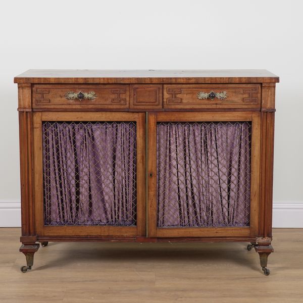 A REGENCY GILT METAL MOUNTED MAHOGANY SIDE CABINET