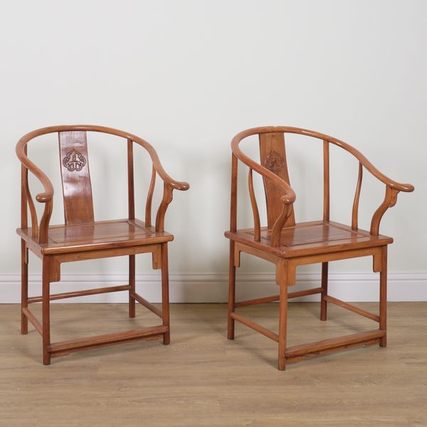 A PAIR OF 20TH CENTURY CHINESE EXPORT ELM HORSESHOE BACK ARMCHAIRS (2)