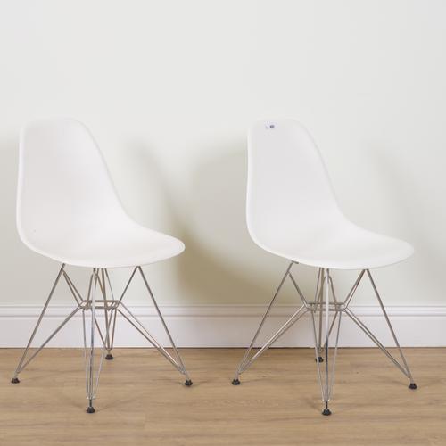 VITRA; AFTER CHARLES AND RAY EAMES A PAIR OF WHITE PLASTIC SIDE CHAIRS (2)