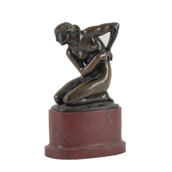 ERNST SEGER: A GERMAN ART DECO BRONZE FIGURE OF A KNEELING WOMAN