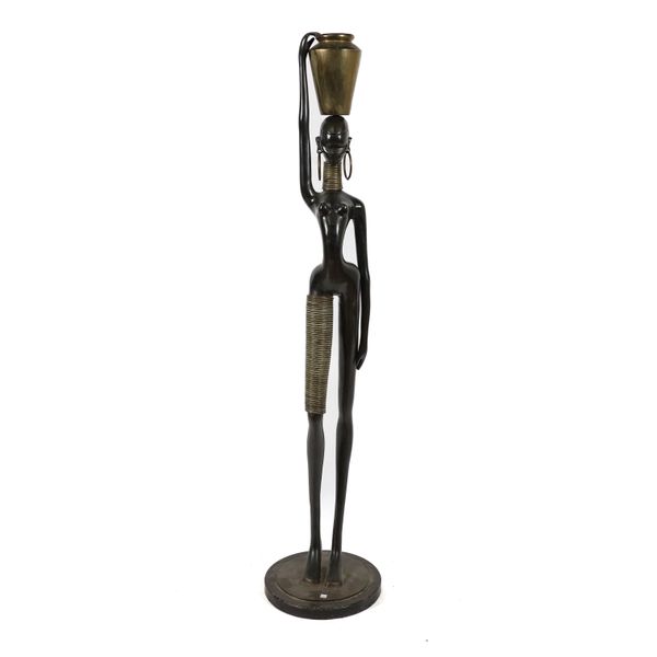 A PATINATED BRASS STANDING FEMALE FIGURE IN THE MANNER OF KARL HAGENAUER