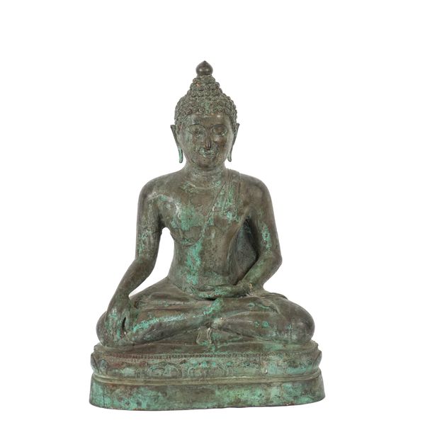 A SOUTH EAST ASIAN VERDI-GRIS PATINATED METAL SEATED BUDDHA