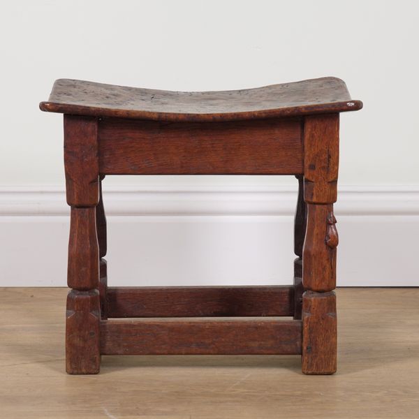 ROBERT MOUSEMAN THOMPSON OF KILBURN; A POLLARD OAK ADZED TOPPED STOOL