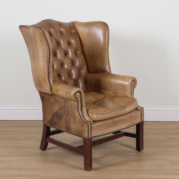 A MID-18TH CENTURY STYLE STUDDED LEATHER UPHOLSTERED WING BACK CHAIR