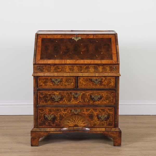 AN EARLY 18TH CENTURY STYLE OYSTER VENEERED LABURNUM BUREAU