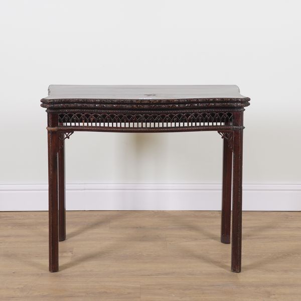 A MID-18TH CENTURY MAHOGANY SERPENTINE FOLDOVER CARD TABLE